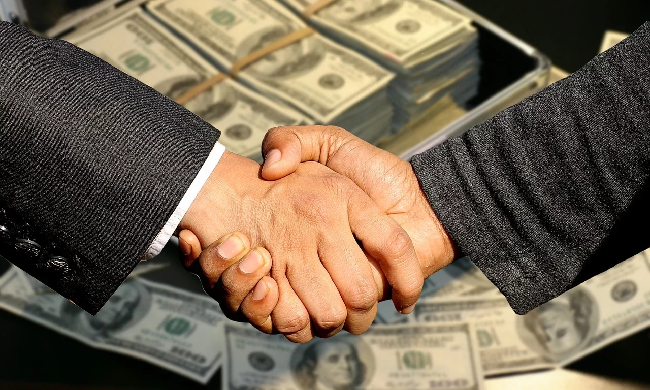 Handschütteln / Dollar